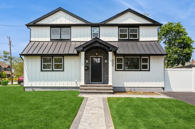 1541 Midian St, North Merrick, NY 11566 - view of front of property featuring a standing seam roof and metal roof