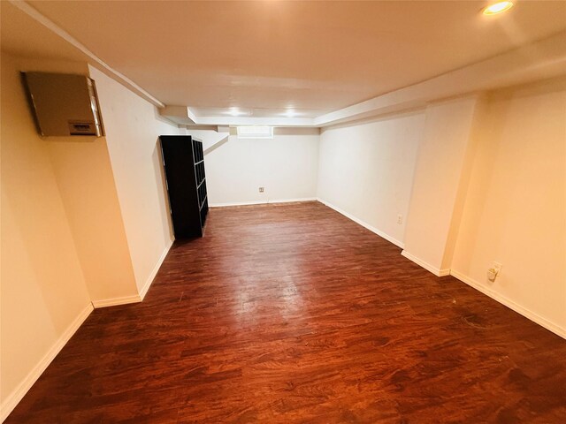 56 Elwood Rd, Northport, NY 11768 - finished below grade area featuring baseboards, dark wood-style floors, and recessed lighting
