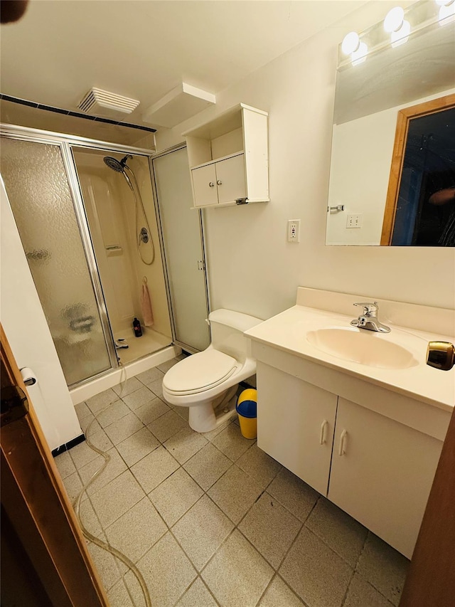 56 Elwood Rd, Northport, NY 11768 - bathroom with a shower stall, vanity, and toilet