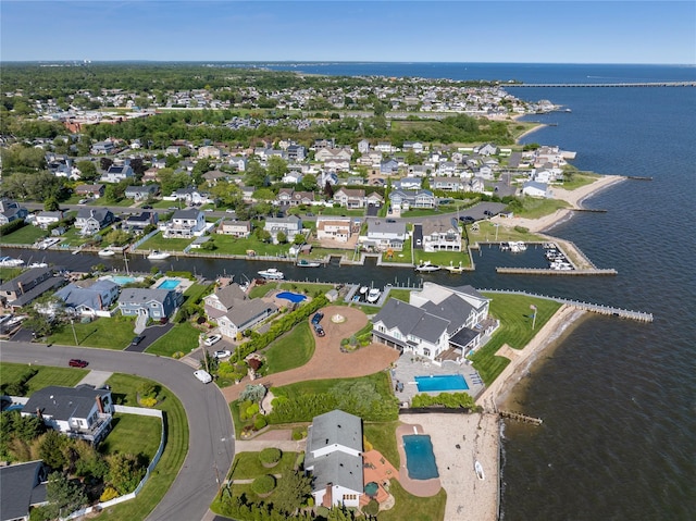 167 Secatogue Ln W, West Islip, NY 11795 - aerial view of property and surrounding area featuring a nearby body of water, a pool, and nearby suburban area