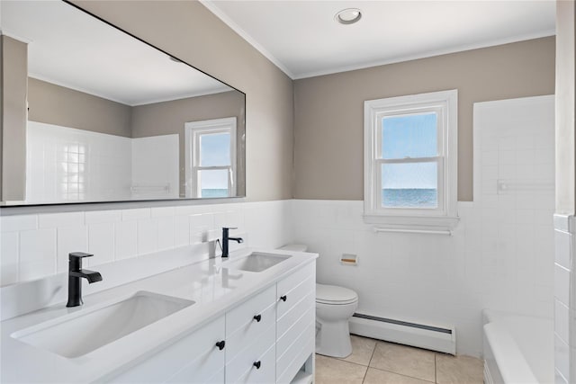 167 Secatogue Ln W, West Islip, NY 11795 - bathroom featuring a baseboard heating unit, tile walls, toilet, tile patterned floors, and double vanity