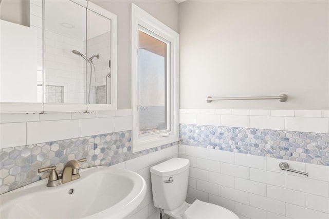 167 Secatogue Ln W, West Islip, NY 11795 - bathroom with a sink, toilet, tile walls, and a tile shower