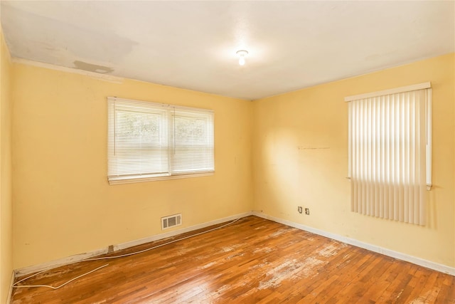 18 Hilliard Ave, Central Islip, NY 11722 - empty room featuring hardwood / wood-style flooring and baseboards