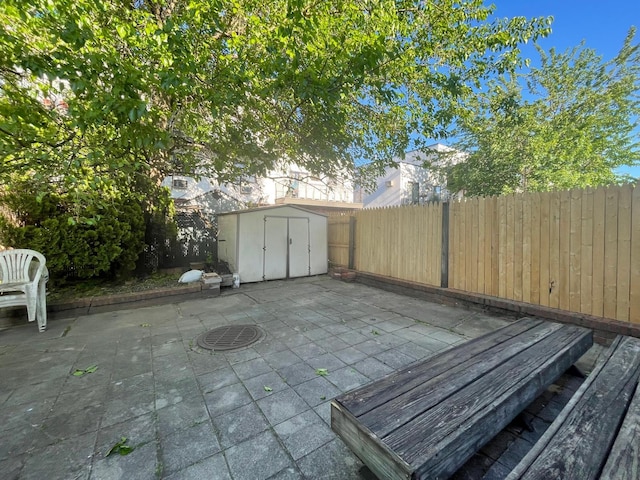 3-15 127th St, College Point, NY 11356 - fenced backyard featuring a patio area
