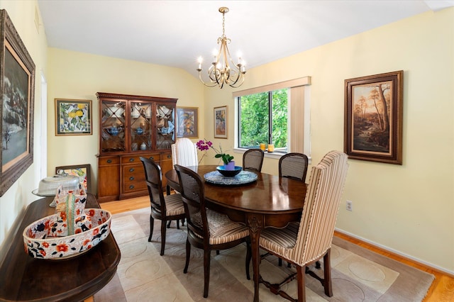 298 Heritage Hls Unit A, Somers, NY 10589 - dining area featuring a chandelier, light wood-type flooring, and baseboards