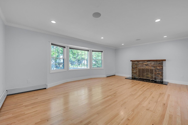 56 Washington Ave, Garden City, NY 11530 - unfurnished living room featuring light wood finished floors, recessed lighting, a fireplace with raised hearth, crown molding, and baseboards