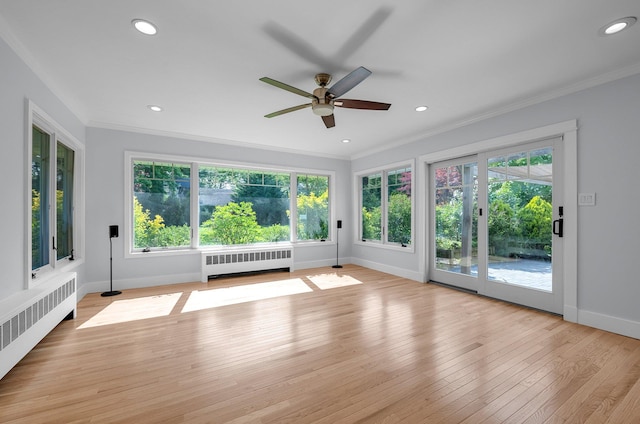 56 Washington Ave, Garden City, NY 11530 - unfurnished sunroom featuring radiator heating unit