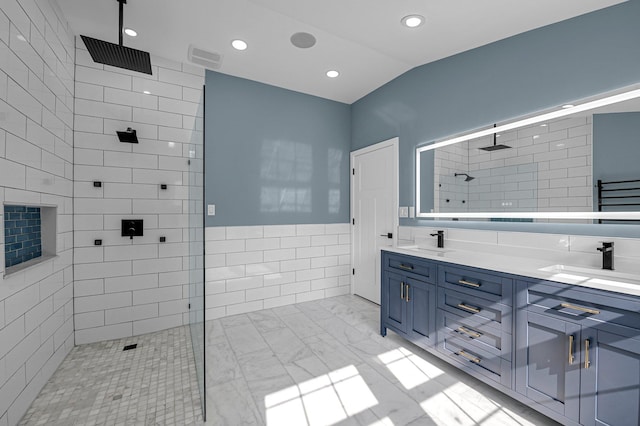 56 Washington Ave, Garden City, NY 11530 - full bath with a walk in shower, double vanity, recessed lighting, marble look tile flooring, and tile walls