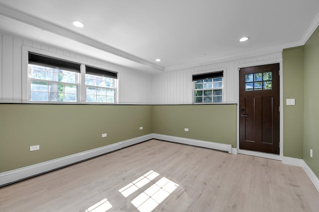 56 Washington Ave, Garden City, NY 11530 - foyer entrance featuring crown molding, healthy amount of natural light, wood finished floors, baseboards, and recessed lighting