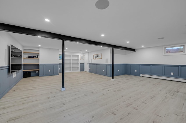 56 Washington Ave, Garden City, NY 11530 - below grade area featuring baseboard heating, light wood finished floors, recessed lighting, and built in features