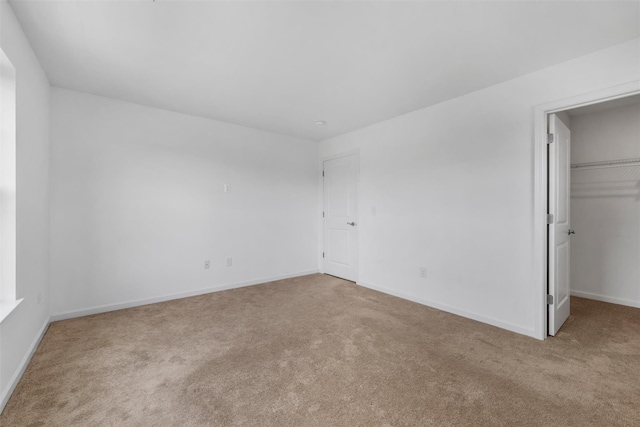 19 Woodrose Ct, Middletown, NY 10940 - unfurnished bedroom with carpet flooring, baseboards, a spacious closet, and a closet