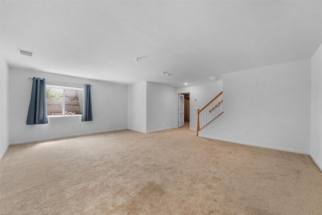 19 Woodrose Ct, Middletown, NY 10940 - empty room featuring carpet floors, stairs, and baseboards