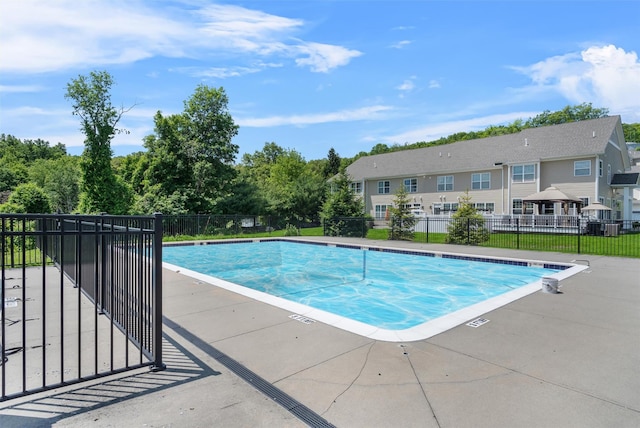19 Woodrose Ct, Middletown, NY 10940 - community pool featuring a patio area and a residential view