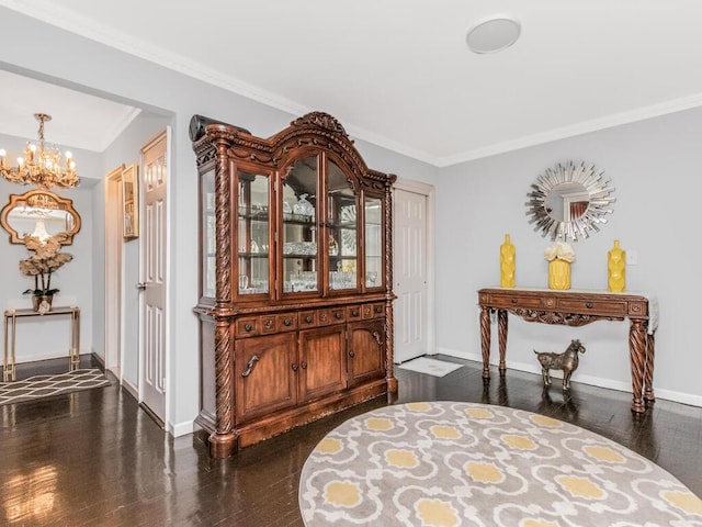 1234 Midland Ave Unit 5C, Bronxville, NY 10708 - dining area with a chandelier, dark wood finished floors, baseboards, and ornamental molding