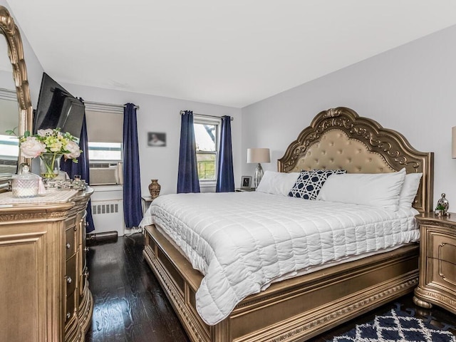 1234 Midland Ave Unit 5C, Bronxville, NY 10708 - bedroom featuring radiator heating unit, dark wood finished floors, and cooling unit