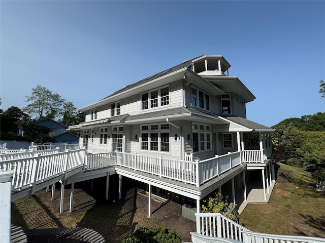 20 Frost Valley Rd, Mount Sinai, NY 11766 - back of house featuring a wooden deck and roof with shingles