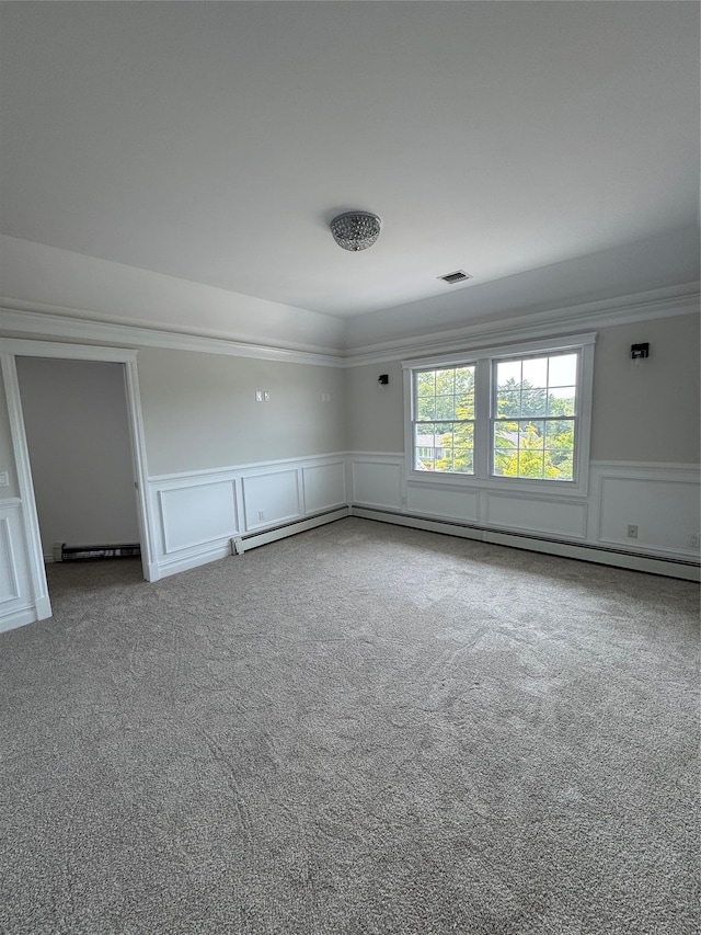 20 Frost Valley Rd, Mount Sinai, NY 11766 - unfurnished room featuring wainscoting, a decorative wall, carpet, and ornamental molding