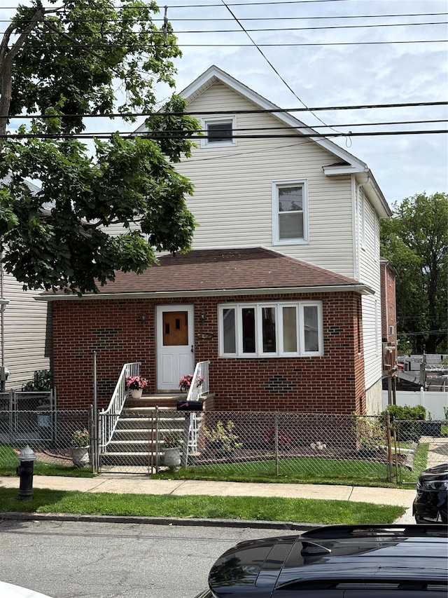 840 Hollywood Ave, Bronx, NY 10465 - view of front of property with brick siding and a fenced front yard
