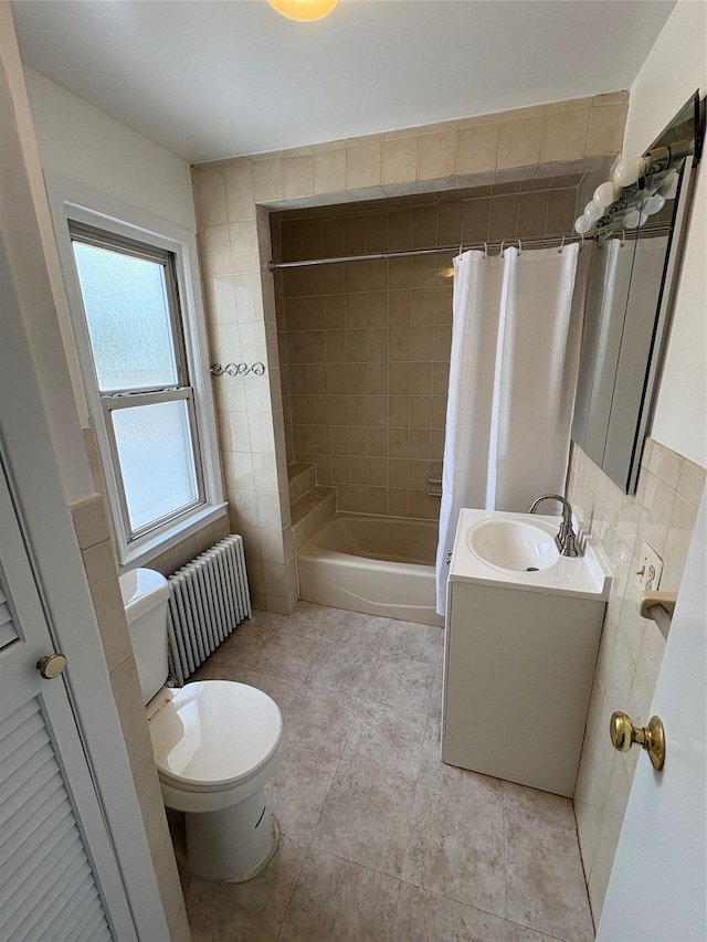 840 Hollywood Ave, Bronx, NY 10465 - full bath with radiator heating unit, toilet, shower / bathtub combination with curtain, vanity, and tile patterned floors