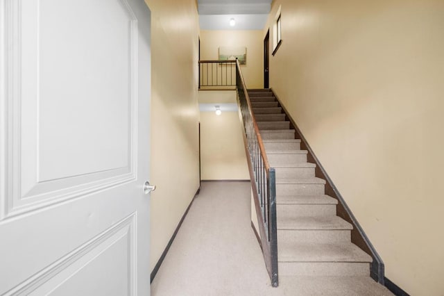 67 Richmond Blvd Unit 2A, Ronkonkoma, NY 11779 - staircase featuring baseboards