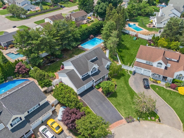 8 Tecumseh Ct, Commack, NY 11725 - aerial perspective of suburban area featuring a pool area
