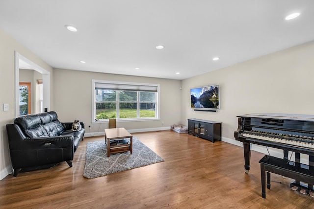 8 Tecumseh Ct, Commack, NY 11725 - living room with baseboards, wood finished floors, and recessed lighting