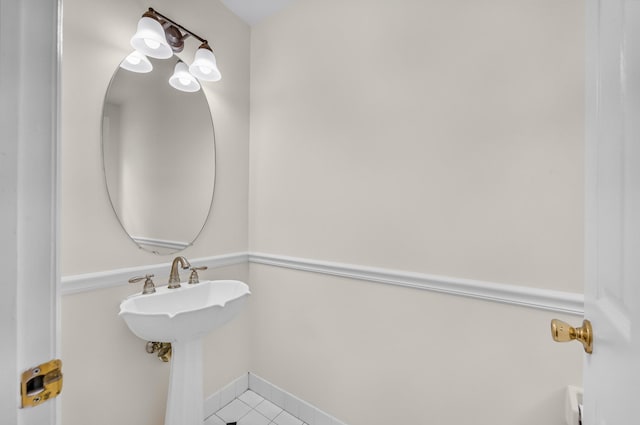 8 Tecumseh Ct, Commack, NY 11725 - bathroom with tile patterned floors and baseboards