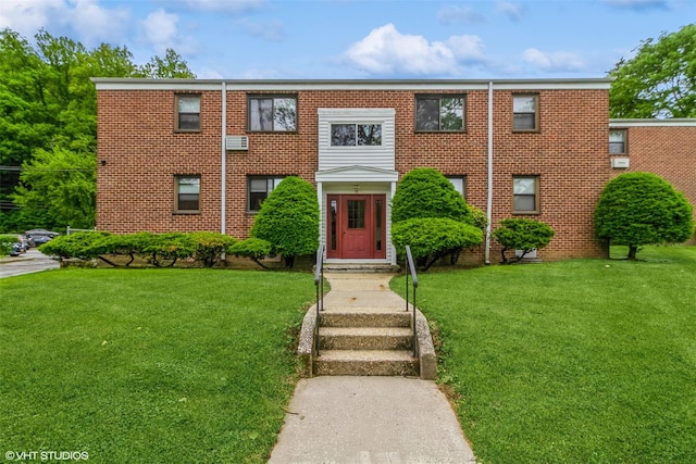 17 Lawrence Dr Unit A, White Plains, NY 10603 - view of front of house with a front yard and brick siding