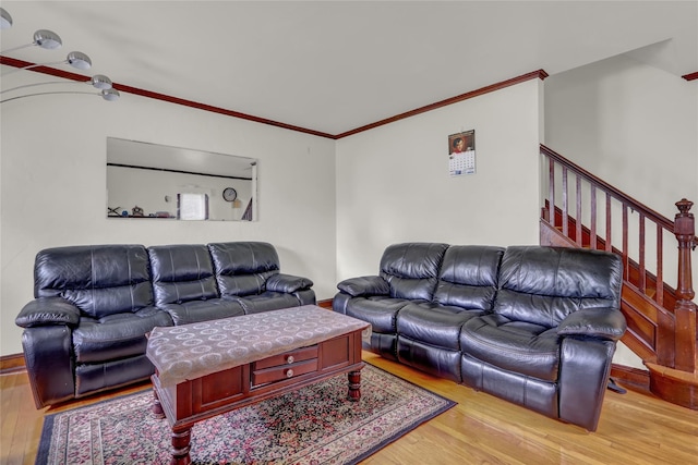 62 Herman Blvd, Franklin Square, NY 11010 - living room featuring ornamental molding, light wood-type flooring, stairway, and baseboards
