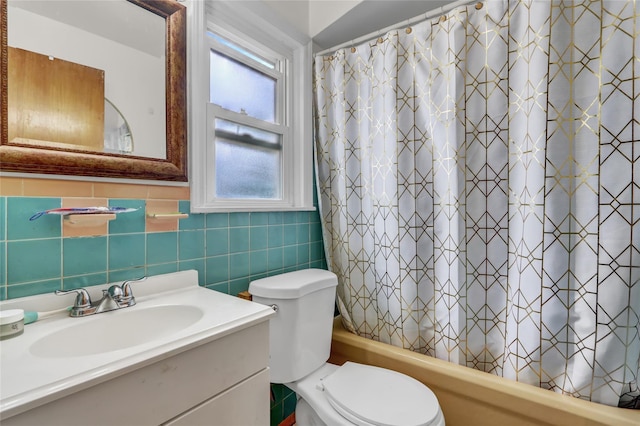 62 Herman Blvd, Franklin Square, NY 11010 - bathroom with vanity, shower / tub combo with curtain, toilet, and tile walls
