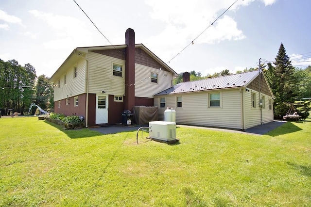 3060 State Route 17b, Cochecton, NY 12726 - back of house featuring a chimney and a yard