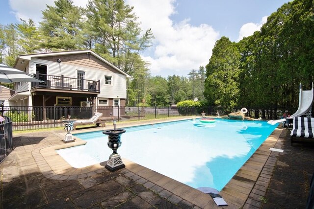 3060 State Route 17b, Cochecton, NY 12726 - view of pool with a water slide and a patio area