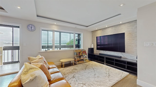 5-16 115th Unit C, College Point, NY 11356 - living room with baseboards, a tray ceiling, recessed lighting, and wood finished floors