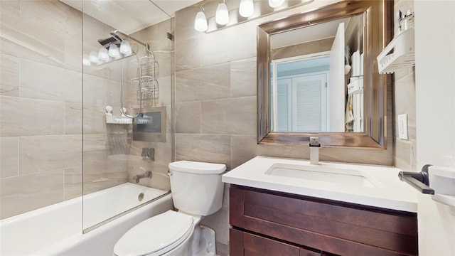 5-16 115th Unit C, College Point, NY 11356 - full bath featuring toilet, bathing tub / shower combination, vanity, and tile walls
