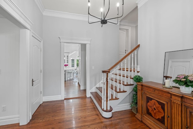 30 Salem Ridge Dr, Huntington, NY 11743 - foyer entrance featuring a chandelier, dark wood-style flooring, ornamental molding, stairway, and baseboards