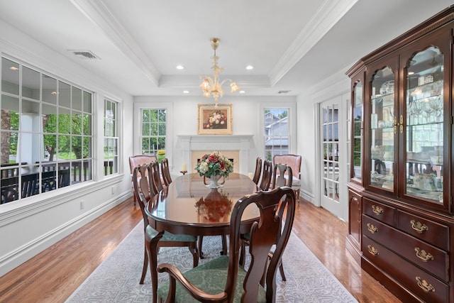 30 Salem Ridge Dr, Huntington, NY 11743 - dining space with a raised ceiling, light wood-type flooring, baseboards, crown molding, and recessed lighting