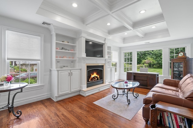 30 Salem Ridge Dr, Huntington, NY 11743 - living room with a glass covered fireplace, wood finished floors, coffered ceiling, crown molding, and recessed lighting