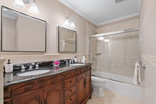30 Salem Ridge Dr, Huntington, NY 11743 - bathroom with tile walls, toilet, tile patterned floors, double vanity, and shower / bath combination with glass door