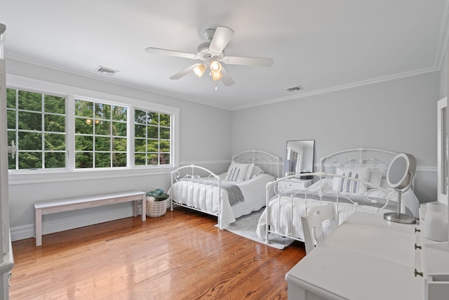 30 Salem Ridge Dr, Huntington, NY 11743 - bedroom with crown molding, a ceiling fan, and wood finished floors