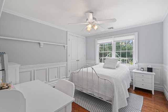 30 Salem Ridge Dr, Huntington, NY 11743 - bedroom with wainscoting, ornamental molding, wood finished floors, a decorative wall, and a ceiling fan