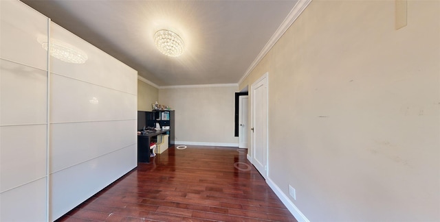 9410 64th Rd Unit B6, Rego Park, NY 11374 - hallway with a chandelier, crown molding, dark wood finished floors, and baseboards