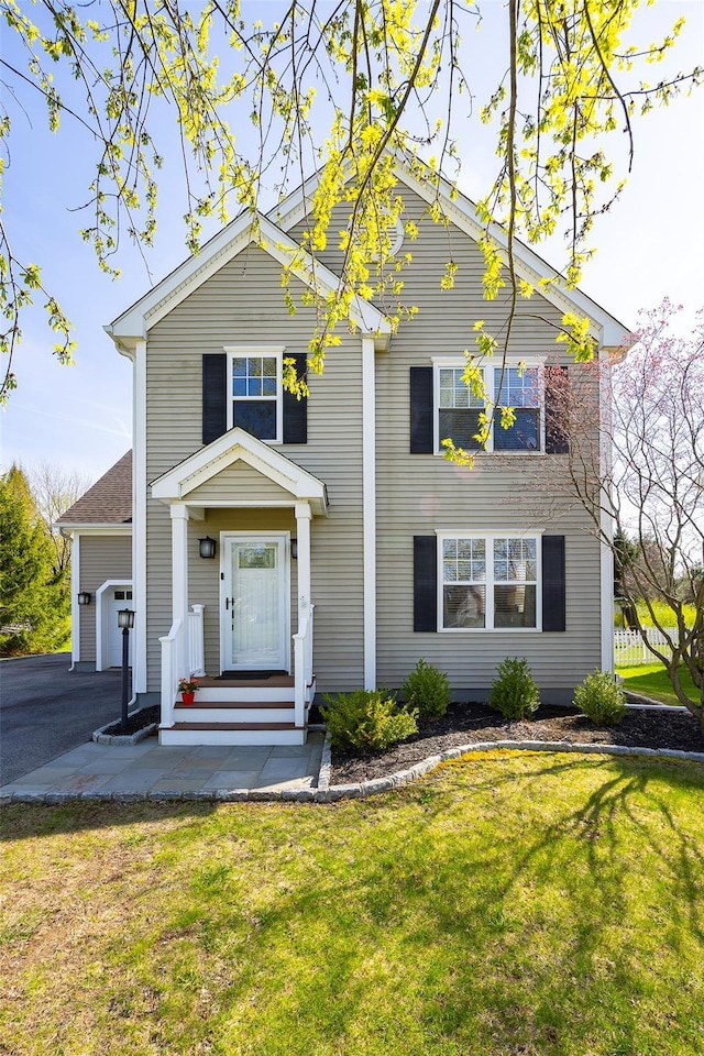 19 Bush Creek Ln, Poughquag, NY 12570 - traditional-style home with a front yard