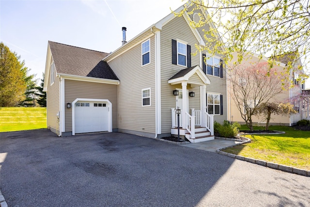 19 Bush Creek Ln, Poughquag, NY 12570 - traditional-style home with an attached garage, driveway, and a front lawn