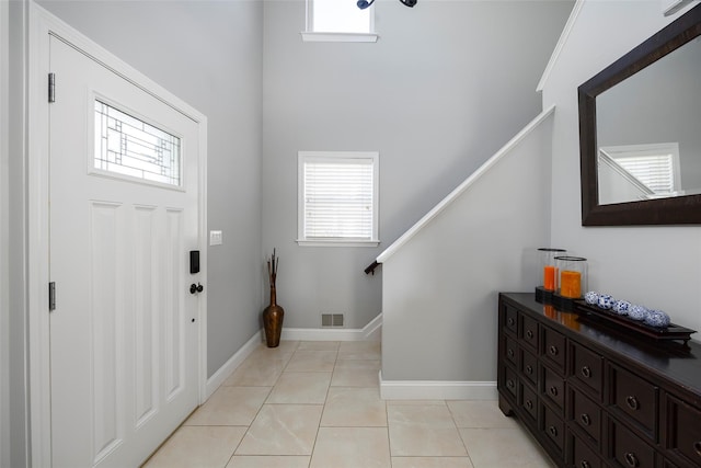 19 Bush Creek Ln, Poughquag, NY 12570 - foyer featuring healthy amount of natural light, stairs, and baseboards