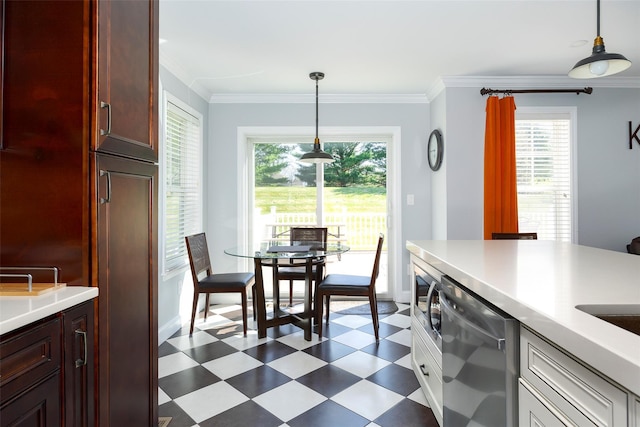 19 Bush Creek Ln, Poughquag, NY 12570 - kitchen with appliances with stainless steel finishes, dark floors, light countertops, ornamental molding, and hanging light fixtures