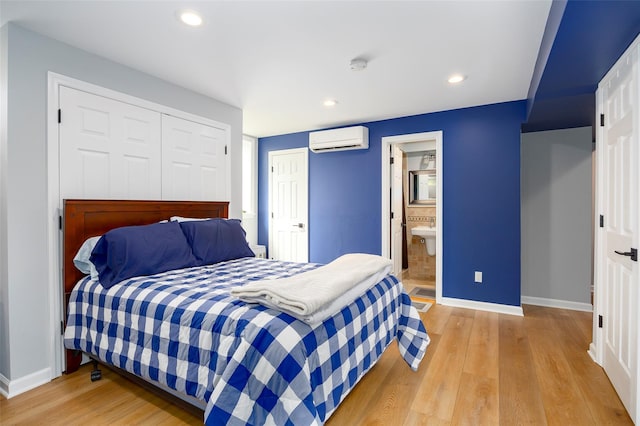 19 Bush Creek Ln, Poughquag, NY 12570 - bedroom featuring a wall mounted AC, light wood-style flooring, baseboards, a closet, and recessed lighting
