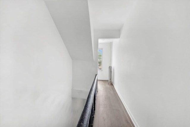 17 Lamartine Ave, Yonkers, NY 10701 - hall featuring radiator heating unit, an upstairs landing, wood finished floors, lofted ceiling, and baseboards