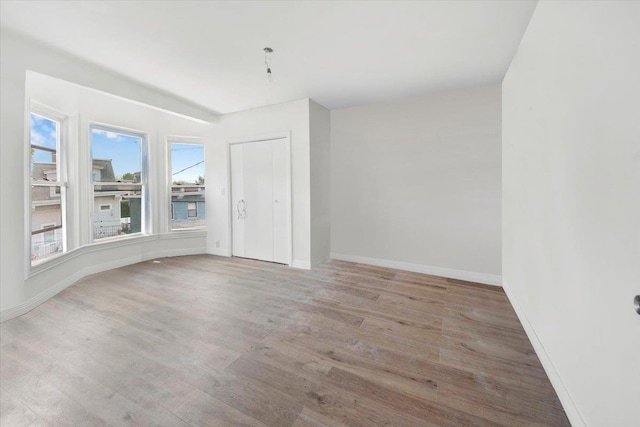 17 Lamartine Ave, Yonkers, NY 10701 - empty room featuring wood finished floors and baseboards