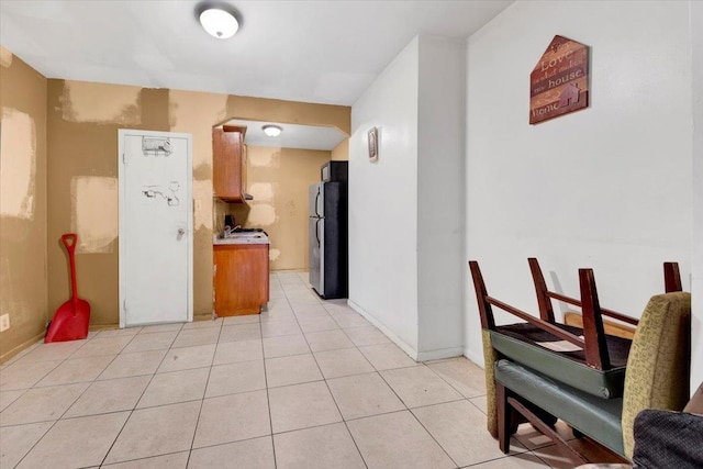 17 Lamartine Ave, Yonkers, NY 10701 - kitchen with freestanding refrigerator, light tile patterned floors, light countertops, and baseboards