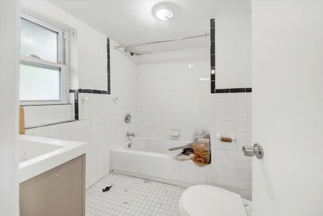 17 Lamartine Ave, Yonkers, NY 10701 - bathroom with tile walls, toilet, bathtub / shower combination, vanity, and tile patterned flooring